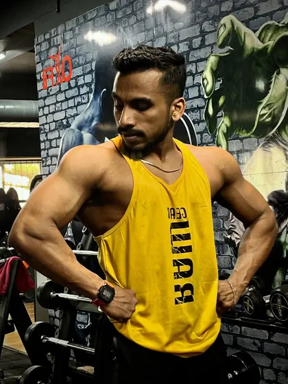 You have to start to be great. Here I am in a classic bodybuilding pose, showcasing the arm and chest development that comes from starting the journey and never looking back.
