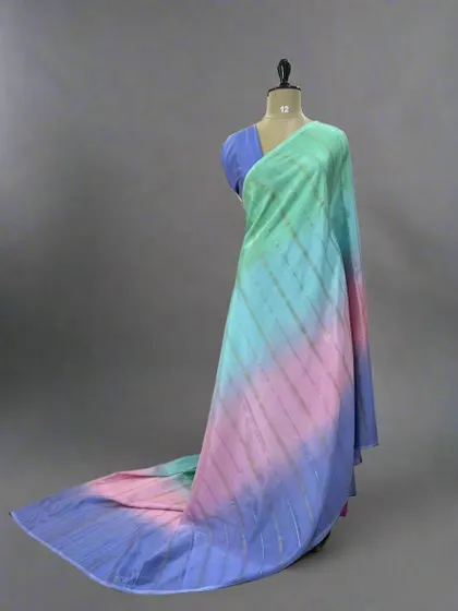 A vibrant Rangkat pure Mysore silk saree with shades of green, pink, and blue.