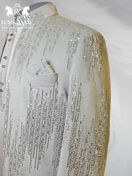 A closer look at the sequin work and pocket detail on the white Indo-Western jacket.