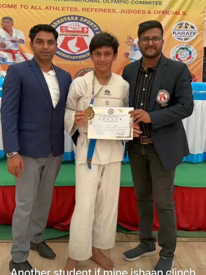 My student Ishaan after winning his match and securing his place on the podium.