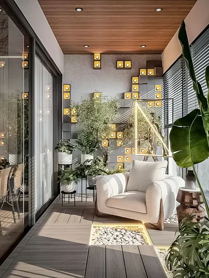 This narrow balcony is transformed into a sophisticated lounge with a plush armchair and unique wall lighting. The illuminated 3D wall panels serve as both a light source and a modern art piece.