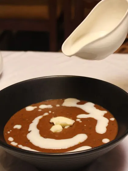 Indulge in the creamy richness of Dal Makhani, a comforting classic that delights the senses with every spoonful.