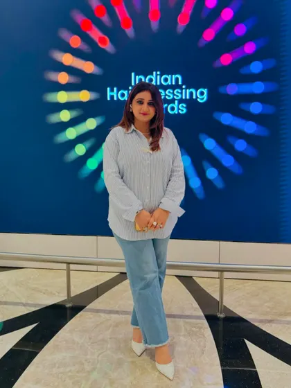 Here I am at a L'Oréal Professional event in Mumbai. I am committed to continuous learning and staying on top of the latest trends where fashion and hair care meet.