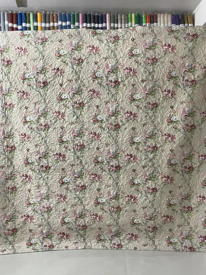 The floral backing fabric of the Chandelier quilt.