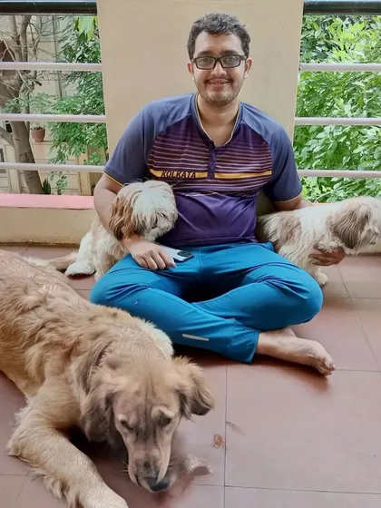A moment of calm on the balcony with Shreyas and a few of our guests. Cuddles and quiet time are just as important as playtime.