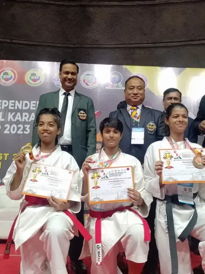 Our girls team displaying their hard earned medals. We train female athletes to be strong, confident, and victorious.