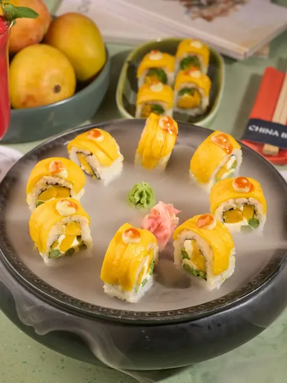 Mango sushi from China Bistro, a unique seasonal special. We used dramatic dry ice to create an eye-catching photo that highlights the creativity of the dish.