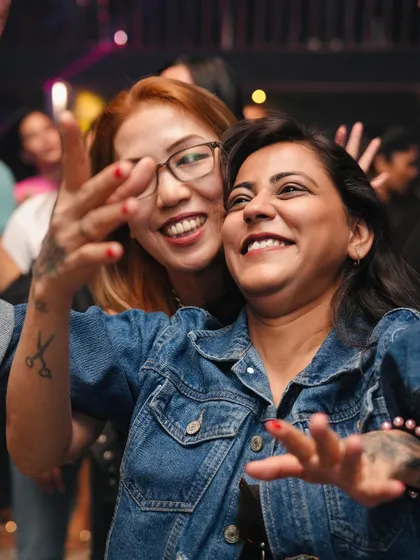 Friends making memories on the dance floor.