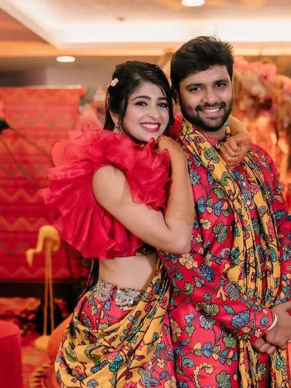A lovely portrait of the couple during their Mehendi function. The decor, with its warm tones and eclectic elements, provides a stunning setting for their photos.