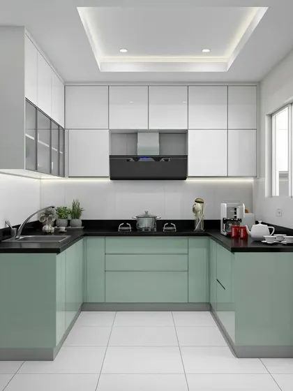 A U-shaped kitchen with a fresh color palette of mint green and white. The design is clean, modern, and highly functional.