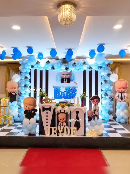 A wide shot of the Boss Baby setup, showing the full stage and balloon arrangement.