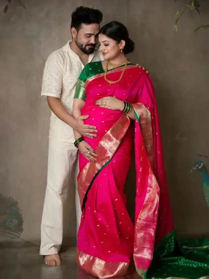 A tender embrace that says it all. This photo beautifully captures the love and support between the expecting parents.