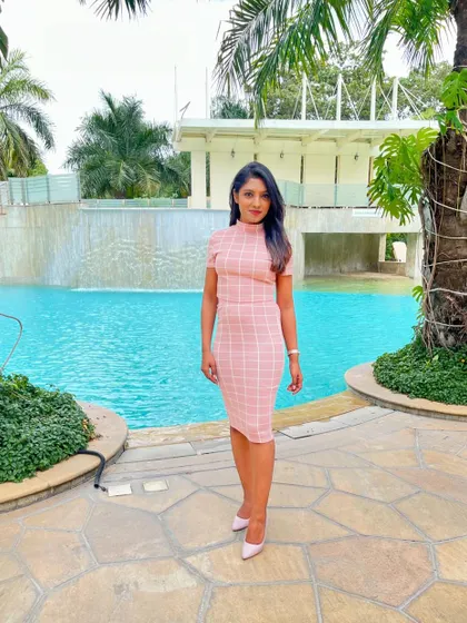A full-length shot by the pool at the Google Pay Women+ team building offsite.