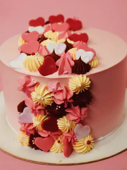A closer look at the artistic cascade of hearts and swirls. This butterscotch-flavored cake is as delicious as it is beautiful.