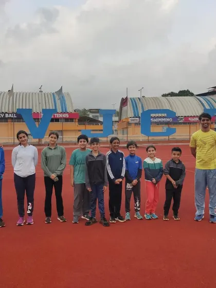 Our team stands proud at the world-class SVJCT Sports Academy facility in Chiplun. Our intensive off-site camps are designed to build a strong, united team away from distractions, fostering discipline and a shared drive for success.