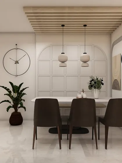 Another perspective of the dining space, highlighting the clean lines of the table and the subtle elegance of the paneled wall and wooden ceiling accent.