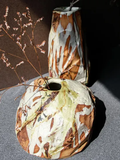 These two Kurinuki vases, styled together, show how different forms and textures can create a beautiful, cohesive display. They are statement pieces, designed to be admired.