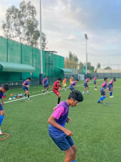Our U15 players working on agility and speed with ring drills during a training session.