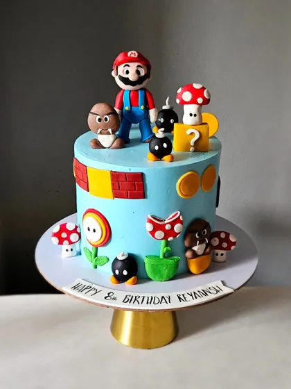 It's-a-me, Mario! This Super Mario theme cake is packed with details, from the iconic red-capped hero to the piranha plants and question blocks. Every element is handmade to create an immersive gaming world.