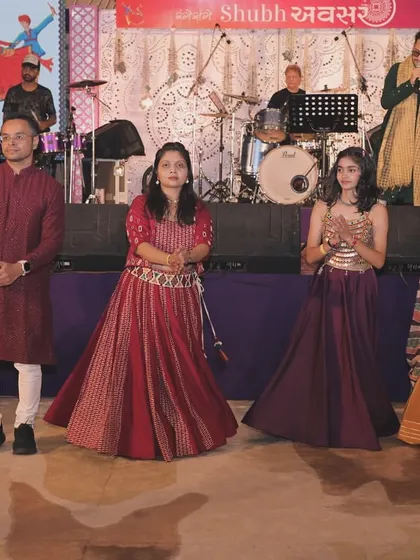 On stage in Surat during a Garba event. You can see the audience fully engaged, learning steps and enjoying the music. My goal is always to make the performance interactive and fun for everyone.
