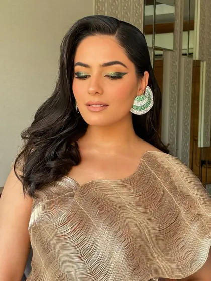 A full look at the gradient green liner I created for Surbhi. The sharp wing and pop of color add a high-fashion edge to her look.