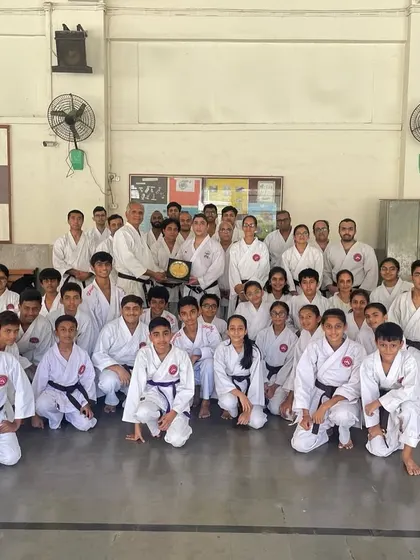 Our senior students and instructors with Sensei Kaivan Fatakia after a seminar on WKF tournament rules and training. Continuous learning is key to staying competitive.