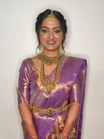 A happy and radiant bride, ready for her big day. The makeup is designed to last and look beautiful from every angle.