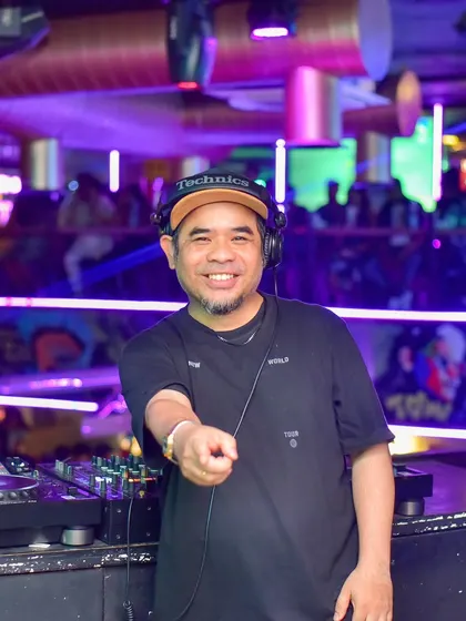 In my element, behind the decks, with my Technics gear. This is where the magic happens. I'm always ready to connect with the crowd and drop the perfect beat.