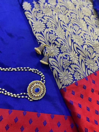 A styling flat-lay for Day 3 of Navratri. A royal blue Banarasi saree paired with beautiful pearl and blue stone jewellery designed by me.