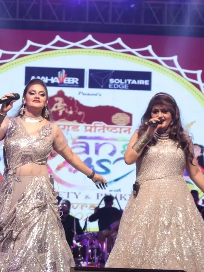 Performing in front of a screen celebrating the 'Rang Raas' Navratri event. Every show is a collaboration with amazing organizers.