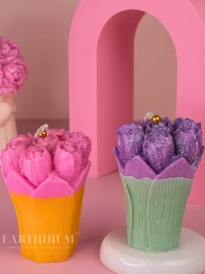 My tulip bouquet pillar candles are a perfect way to bring spring indoors. The glittery purple and pink tulips are bundled together to create a charming, floral-inspired sculpture.