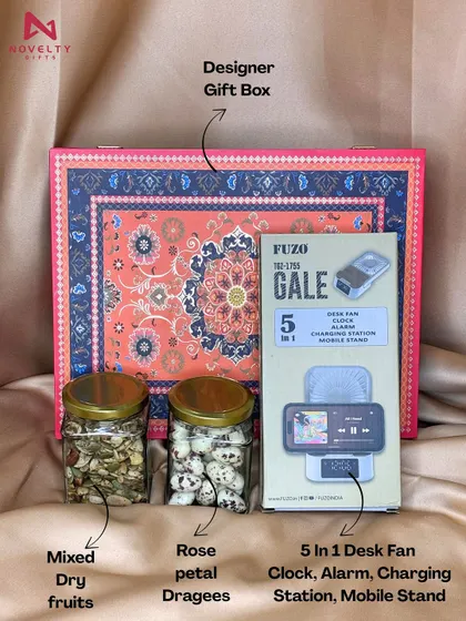 This budget-friendly hamper includes a designer gift box, mixed dry fruits, rose petal dragees, and a 5-in-1 desk fan, offering great value.
