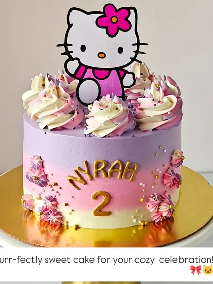 This purr-fectly sweet Hello Kitty cake is great for a cozy celebration. The purple and pink ombre design, topped with the iconic character, is ideal for a second birthday.