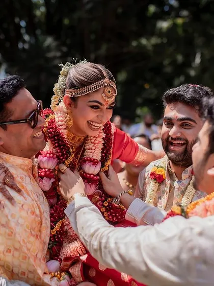 The bride's grand entrance, surrounded by friends and family. We capture the anticipation and excitement of this key moment in the wedding ceremony.