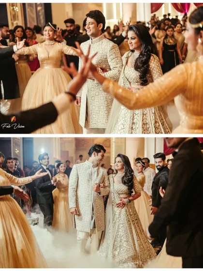 The couple's grand entrance through a corridor of dancers, surrounded by theatrical smoke. We choreograph these moments to create a spectacular visual for your film.