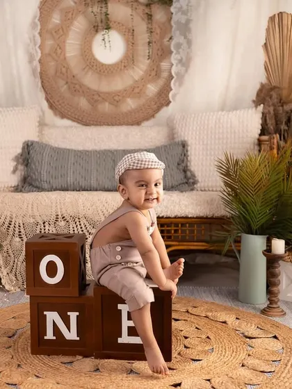 This little guy has so many expressions to offer! The natural, earthy tones of our boho lifestyle set provide the perfect canvas for capturing his personality.