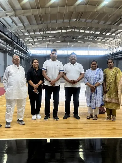 Our guests tour the indoor basketball court, part of our extensive multi-sport facility.