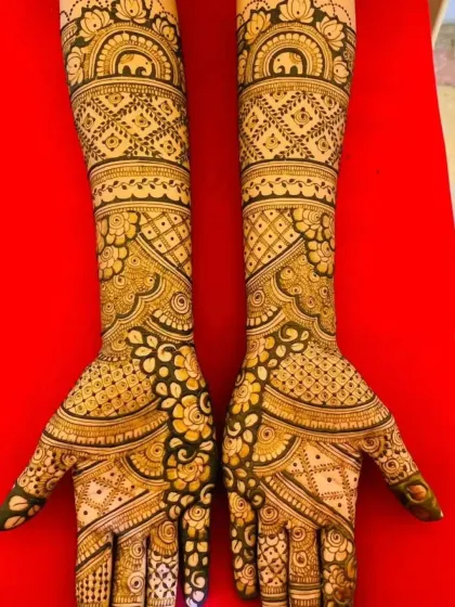 This design showcases my love for traditional, full-coverage mehandi. It is filled with classic Indian motifs like elephants and paisleys, combined with fine lines and geometric patterns for a rich, dense look.