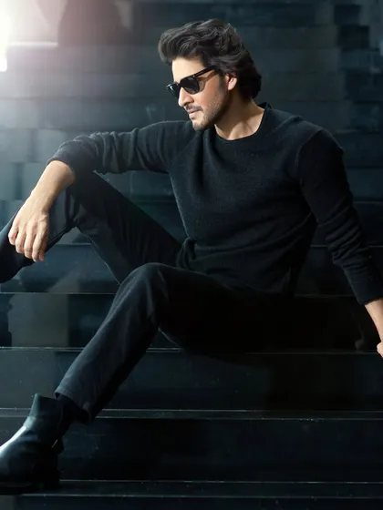 Another shot from the stylish series with Mahesh Babu. The play of light and shadow on the stairs adds a graphic element to this portrait, emphasizing a modern and moody aesthetic.