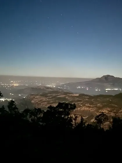 The view from Ratangad at night, with the lights of distant towns spread out below. A serene and beautiful moment from our overnight hike.