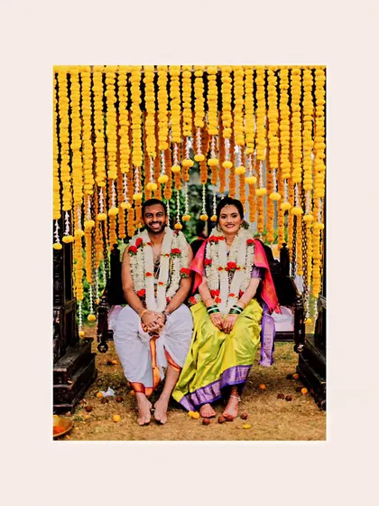 A duplicate of the couple on the marigold swing.