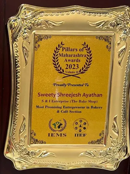 A close-up of the 'Most Promising Entrepreneur in Bakery & Café Section' award presented to our Panvel Franchise.