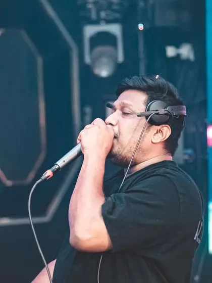 Lost in the music. This is a candid moment of me on the mic, feeling the track and sharing that emotion with everyone on the dance floor.