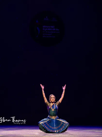 A wide shot showing the scale of the Nishagandhi stage. It is a humbling experience to perform in such a grand auditorium for an appreciative audience.