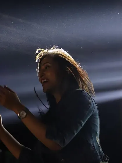 A candid shot from a big stage, lost in the music and the lights. These are the moments of pure, unadulterated joy.