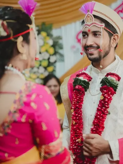 The groom's loving gaze as he sees his bride-to-be during the ceremony. Capturing these fleeting looks is essential to telling the emotional story of your day.