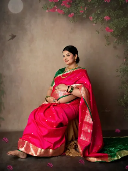 A peaceful and contemplative portrait. The artistic background and the mom's gentle pose create a timeless and beautiful image.