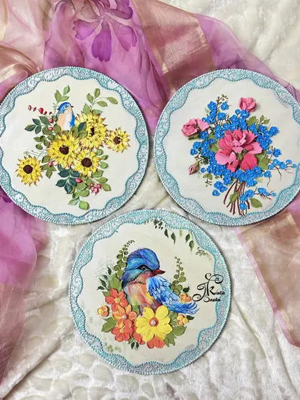 The full set of three wall plates, displayed together. They are designed to be hung as a triptych, creating a larger, cohesive piece of wall art.