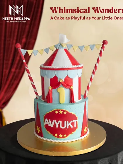 Whimsical wonders. This two-tier circus tent cake is perfect for a playful and colorful first birthday.