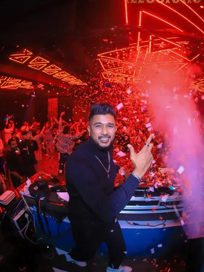 A repeat of the iconic confetti shot from Club Illusions, this time emphasizing my interaction with the camera and the crowd.
